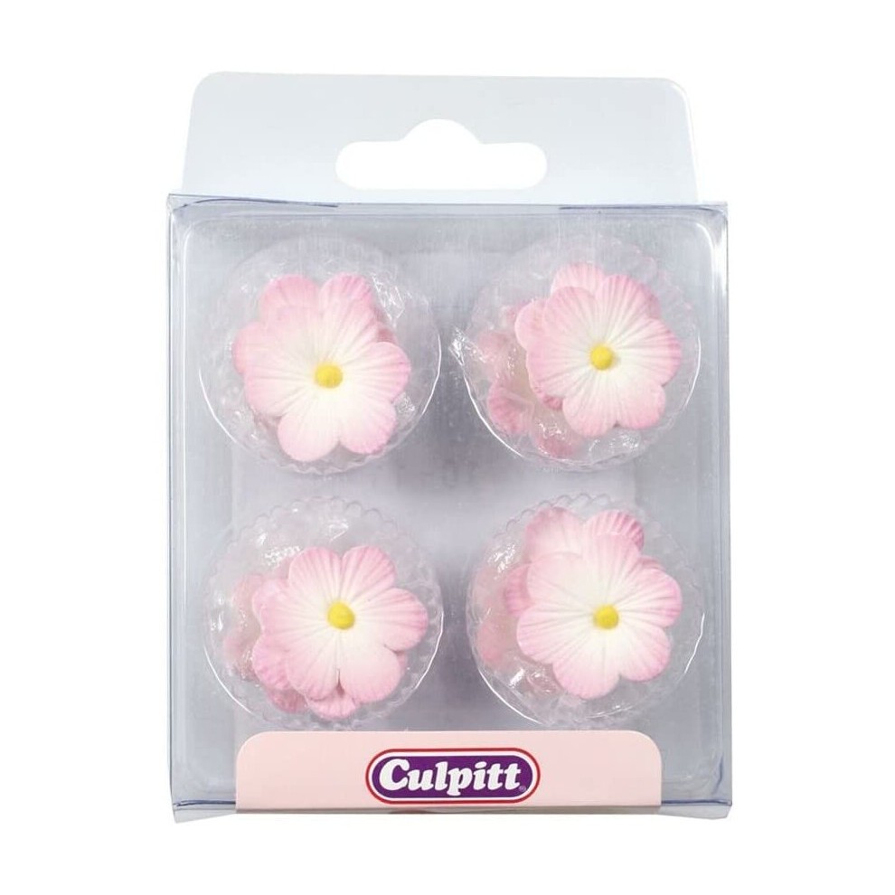 Culpitt Daisies Sugar Pipings in a clear plastic pack, featuring 12 pink and white daisy decorations with yellow centers, ideal for cake and dessert embellishments.