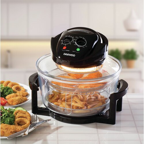 Daewoo SDA1032RD 17L halogen air fryer in black with transparent glass bowl, featuring two control knobs and a heating element, cooking fries and chicken.