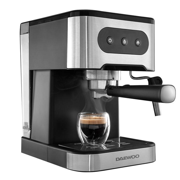Silver and black Daewoo Dual Cup 'Flava' Espresso Coffee Machine with a milk frother, featuring a sleek design, buttons on the front, and a glass cup with espresso underneath.