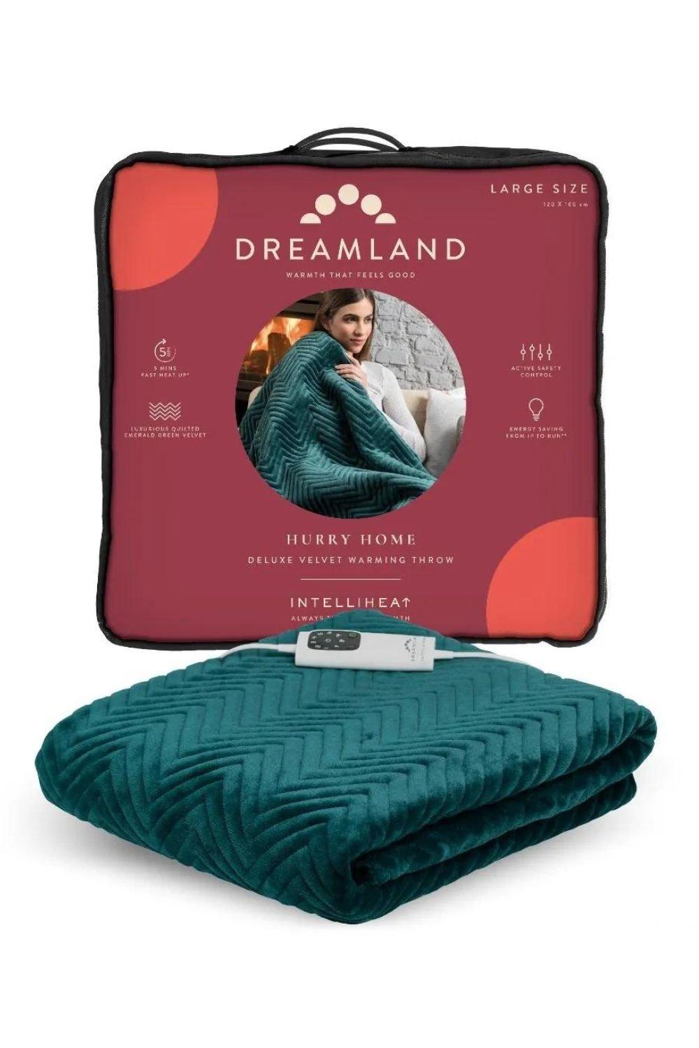 Emerald green deluxe velvet warming throw with a chevron pattern, packaged in a red box featuring a cozy model, highlighting its large size and Intelliheat technology.