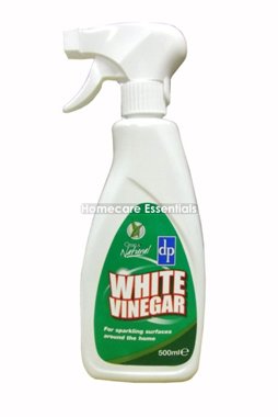 Clear plastic spray bottle with a white trigger top, labeled "WHITE VINEGAR" in bold letters, featuring a green and white design, 500ml size for home cleaning.