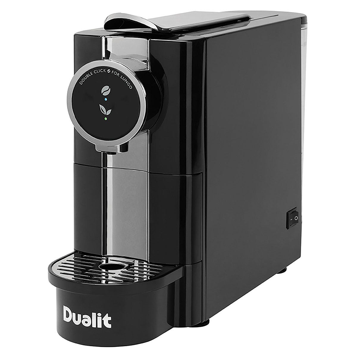 Sleek black Dualit Cafe Plus Capsule Coffee Machine with a circular control panel, a prominent spout, and a drip tray for easy coffee preparation.