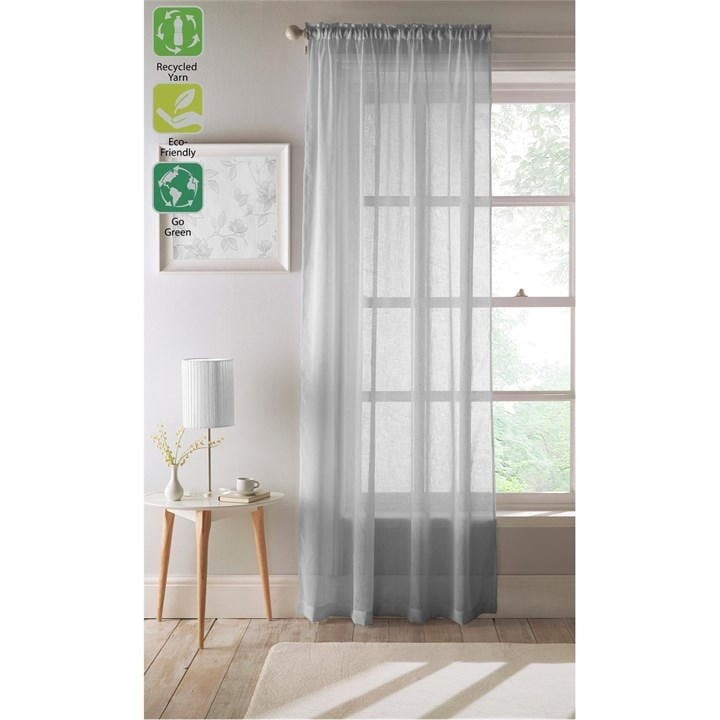 White, sheer voile panel made from 100% recycled material, featuring a slot top design, hanging elegantly in a bright room with natural light. Eco-friendly labels visible.