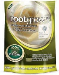 Green and gold packaging of Rootgrow mycorrhizal fungi fertiliser, labeled "NEW" and "100% UK ORIGIN," features a logo of the Royal Horticultural Society and highlights benefits for bareroot plants.
