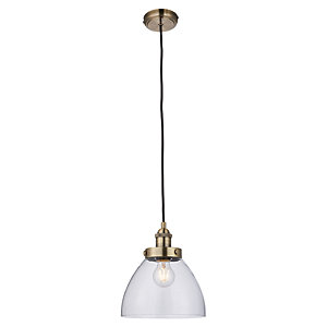 Antique brass pendant light with a clear glass dome shade, featuring a black cord and a vintage-style bulb holder, ideal for adding elegance to any space.