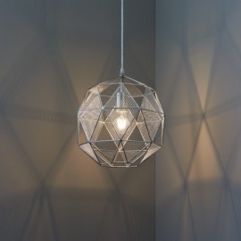 Geometric pendant light in chrome and silver finish, featuring a wireframe design that casts intricate shadows on the wall, with a single bulb at the center.