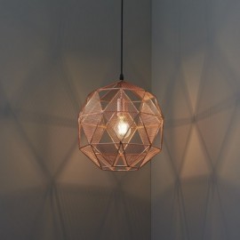 Spherical pendant light with a copper plate finish, featuring a geometric wire design and an E27 bulb, casting intricate shadows on the wall.