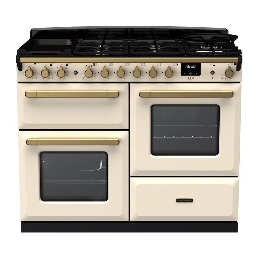 Pale cream dual fuel range cooker with antique brass knobs and handles, featuring four gas burners, two ovens, and a sleek black hob surface.