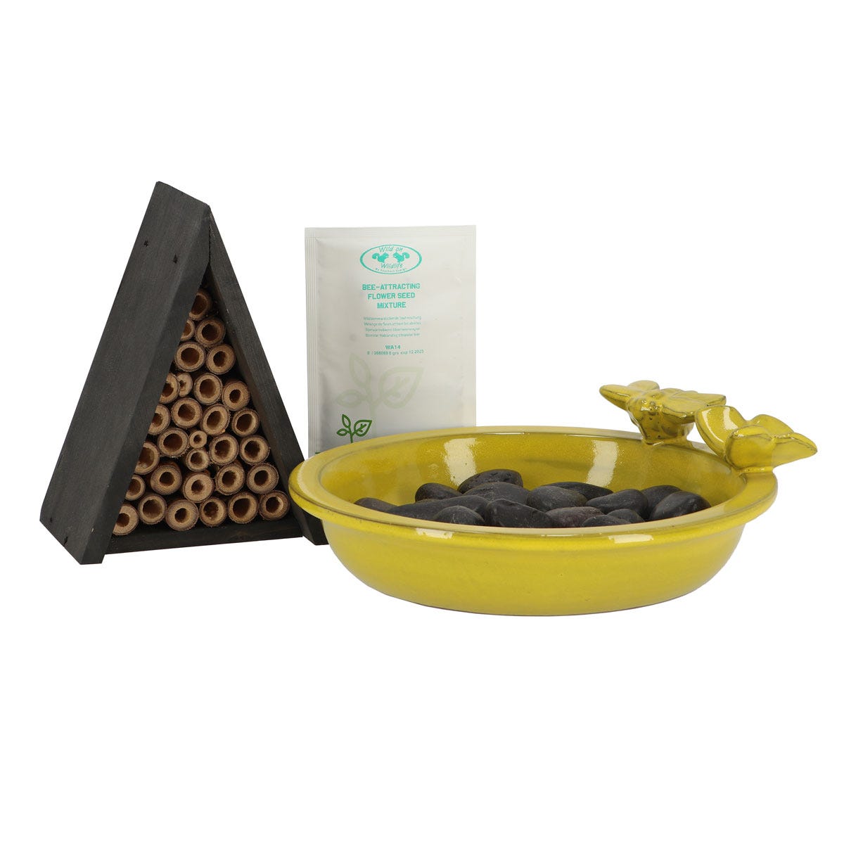 Complete bee kit featuring a bright yellow ceramic bowl with a flower-shaped handle, a black wooden bee house with hollow tubes, and a packet of bee-attracting seeds.