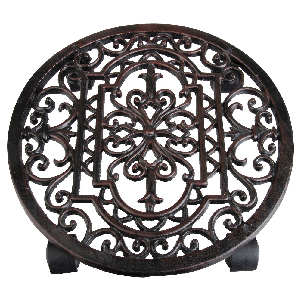 Round brown plant trolley with intricate scrollwork design, made of durable metal, featuring four wheels for easy mobility.