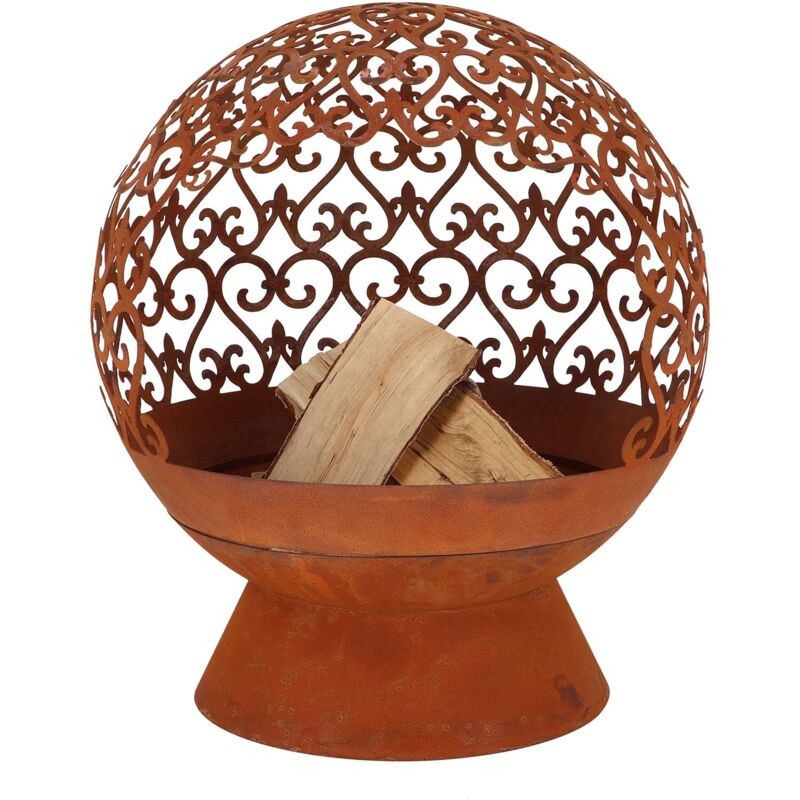 Rusty metal round fire pit with intricate arabesque cutouts, featuring a sturdy base and logs inside for burning.
