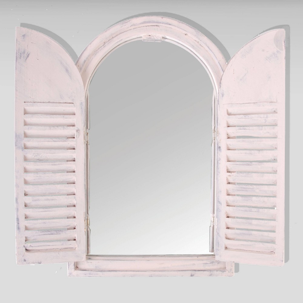 White shutter mirror with an arched top and louvered doors, featuring a distressed finish that adds a vintage charm.