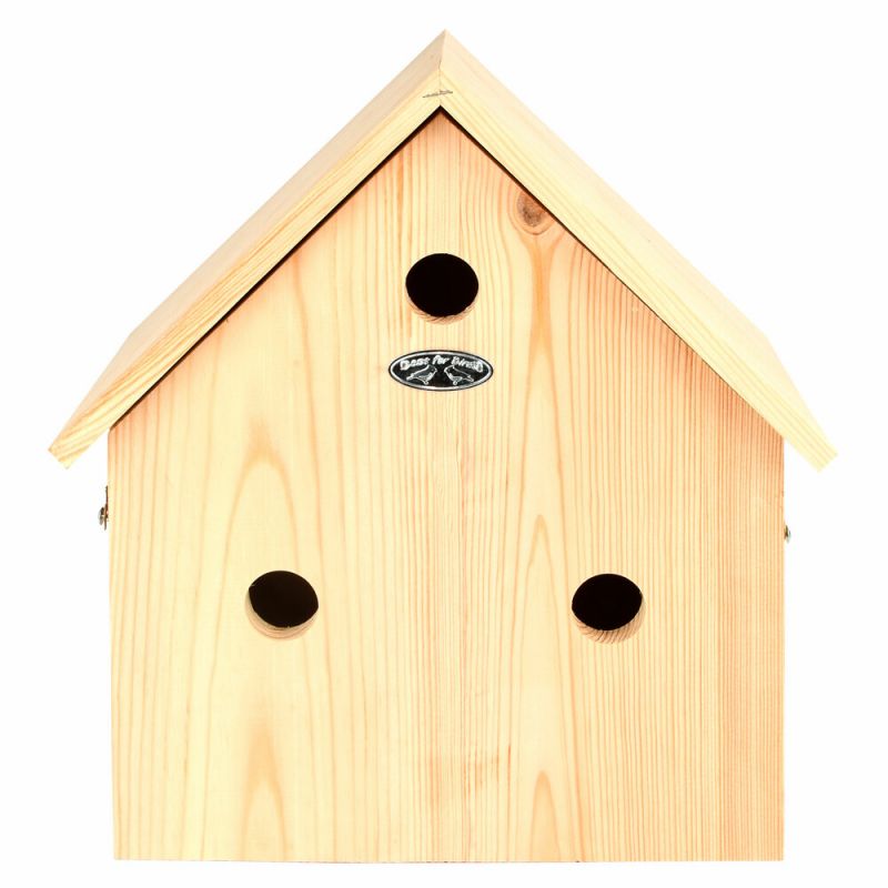 Brown wooden birdhouse with a peaked roof, featuring three circular entry holes and a metal logo plaque, measuring 14.1 inches high, 13.1 inches wide, and 6.5 inches deep.