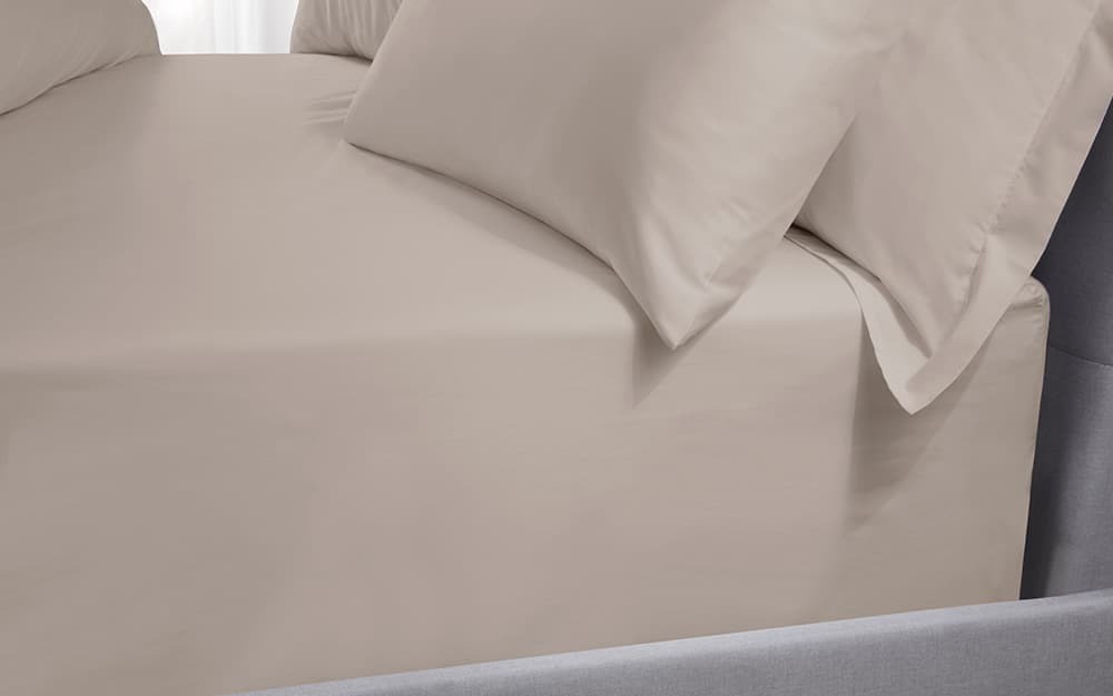 Taupe fitted sheet made from 500TC cotton sateen, designed for double beds, showcasing a smooth, luxurious texture and elegant drape.