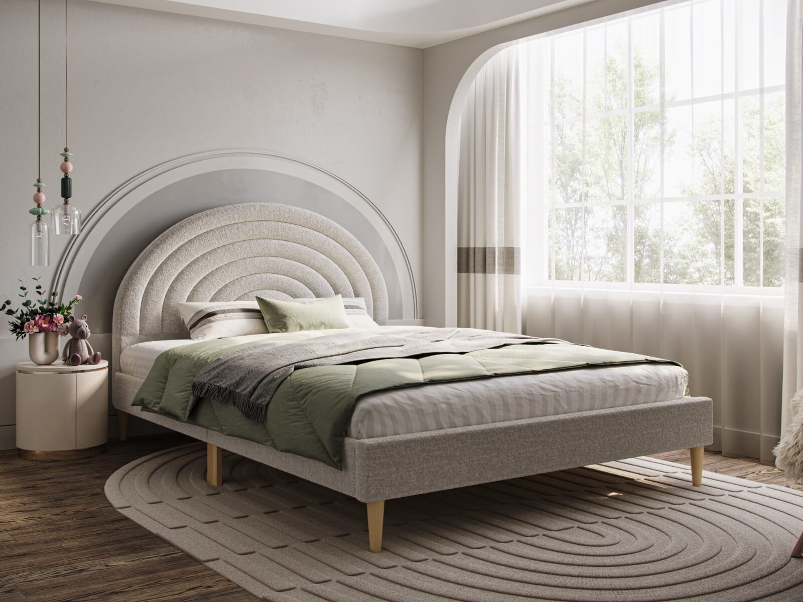 Flair Ava grey boucle single bed features a curved, textured headboard, light grey upholstery, wooden legs, and is styled with soft bedding and decorative pillows in a bright room.