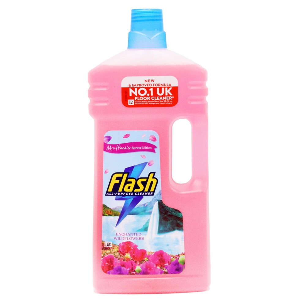 Pink plastic bottle of Flash All Purpose Cleaner, 1500ml, featuring a blue cap, floral design, and "Enchanted Wildflowers" label with a waterfall graphic.