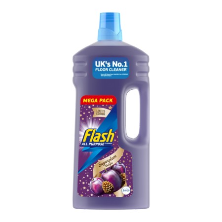 Purple plastic bottle of Flash Liquid All Purpose Cleaner, 1.5L, featuring a blue cap, vibrant label with "Mega Pack" and "Sugar Plum" scent, and images of plums and pinecones.
