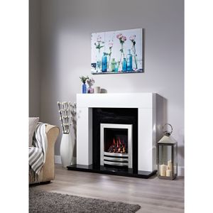White Focal Point Fires Wichita Fire Surround with a sleek design, featuring a black base, set in a cozy room with a floral painting and decorative elements.