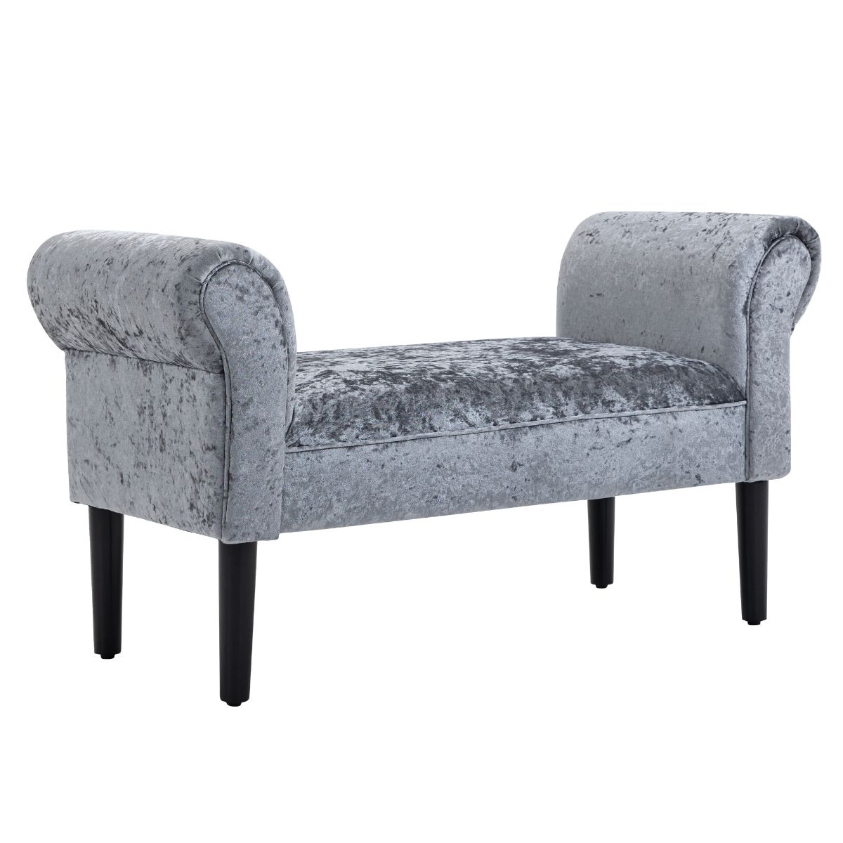 Crushed velvet upholstered bench footstool in ice grey with rounded armrests and black wooden legs, offering a stylish and comfortable seating option.