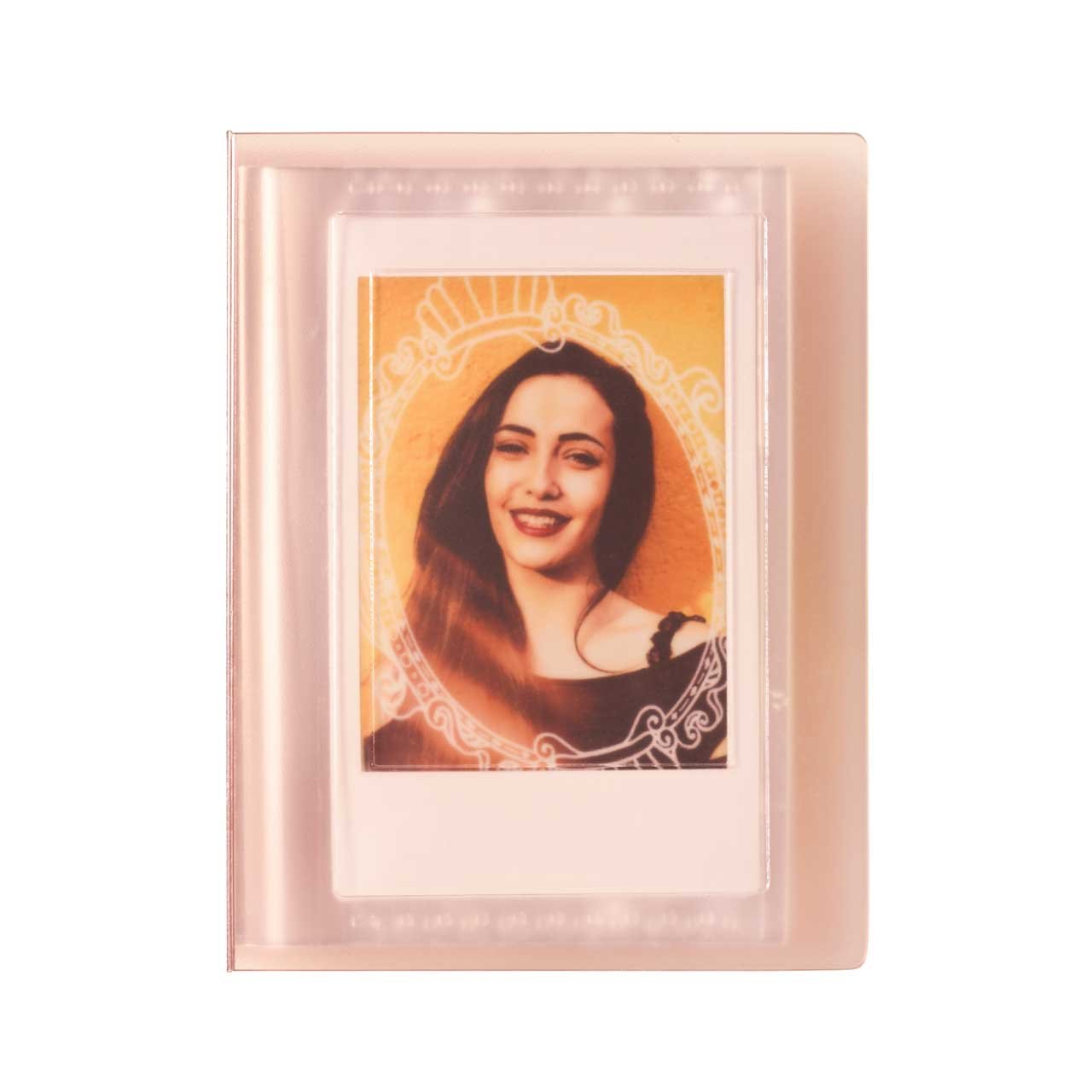Blossom B photo album by Fujifilm, featuring a soft pink cover, designed to hold 108 Instax Mini pictures, with a decorative frame for showcasing photos.