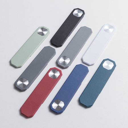 Eight sleek, octagonal-shaped dishwashers in various colors—green, black, gray, white, red, blue—featuring a metallic button, designed for modern kitchens.