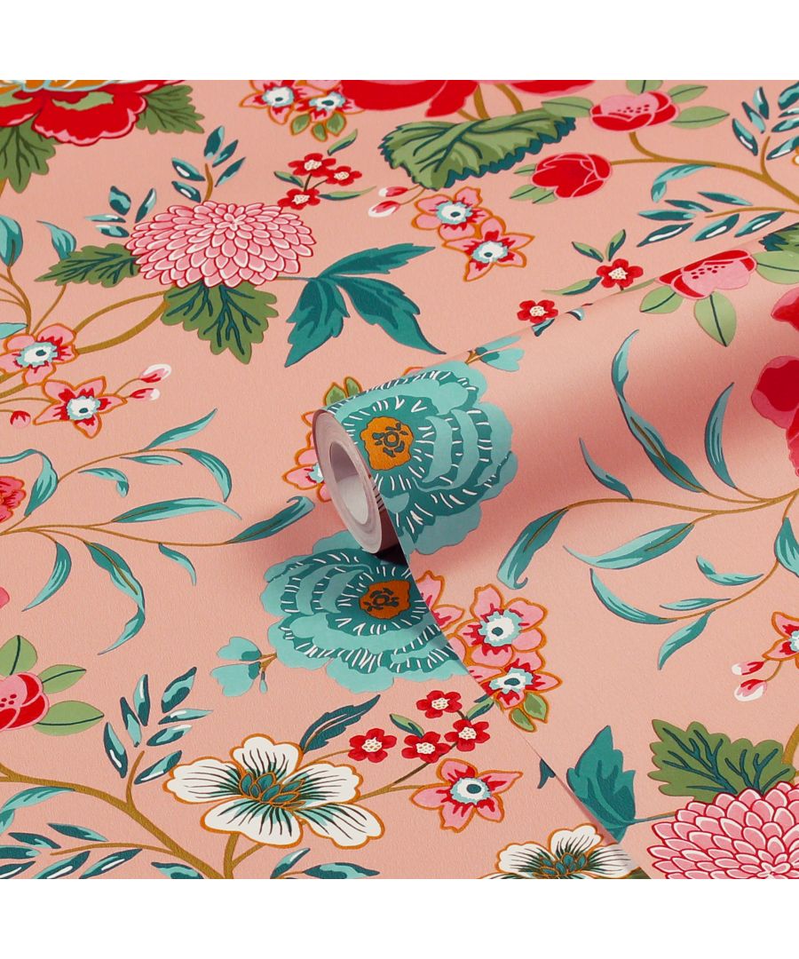 Coral floral printed wallpaper featuring vibrant blooms in teal, pink, and red, with intricate green leaves on a soft pink background, rolled partially for display.