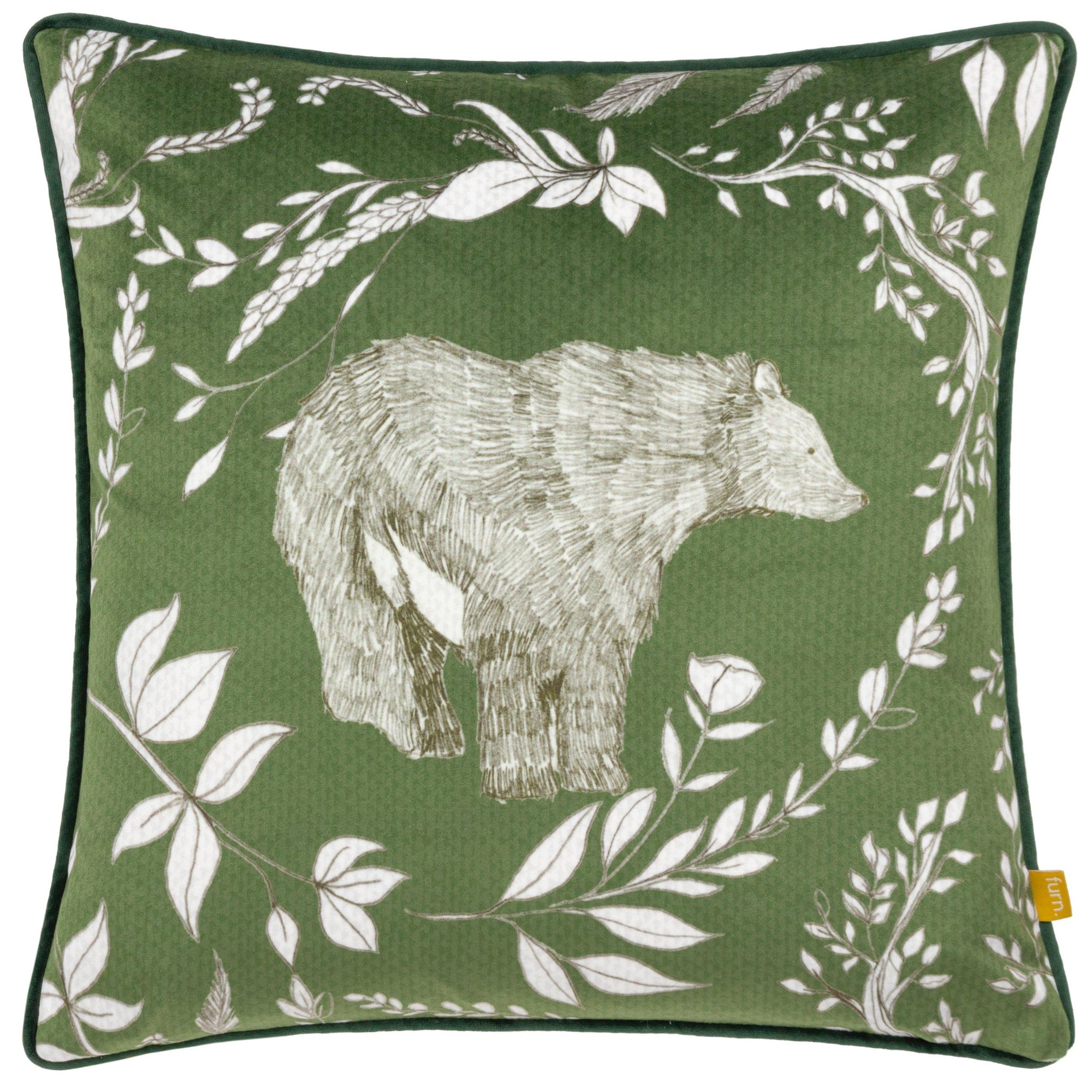 Green velvet cushion featuring a bear illustration surrounded by floral patterns, with piped edges and measuring 43 cm x 43 cm.