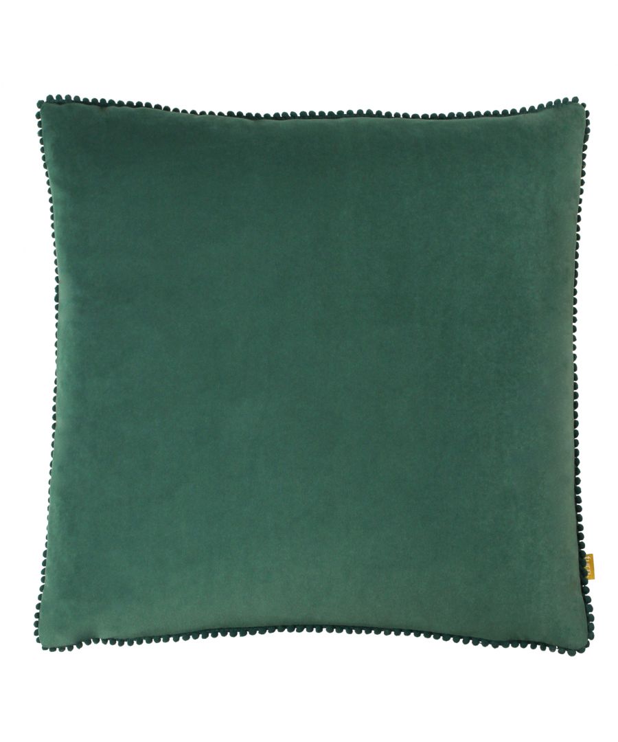 Square marine-colored cushion with a soft velvet texture, featuring a decorative pom-pom trim along the edges.
