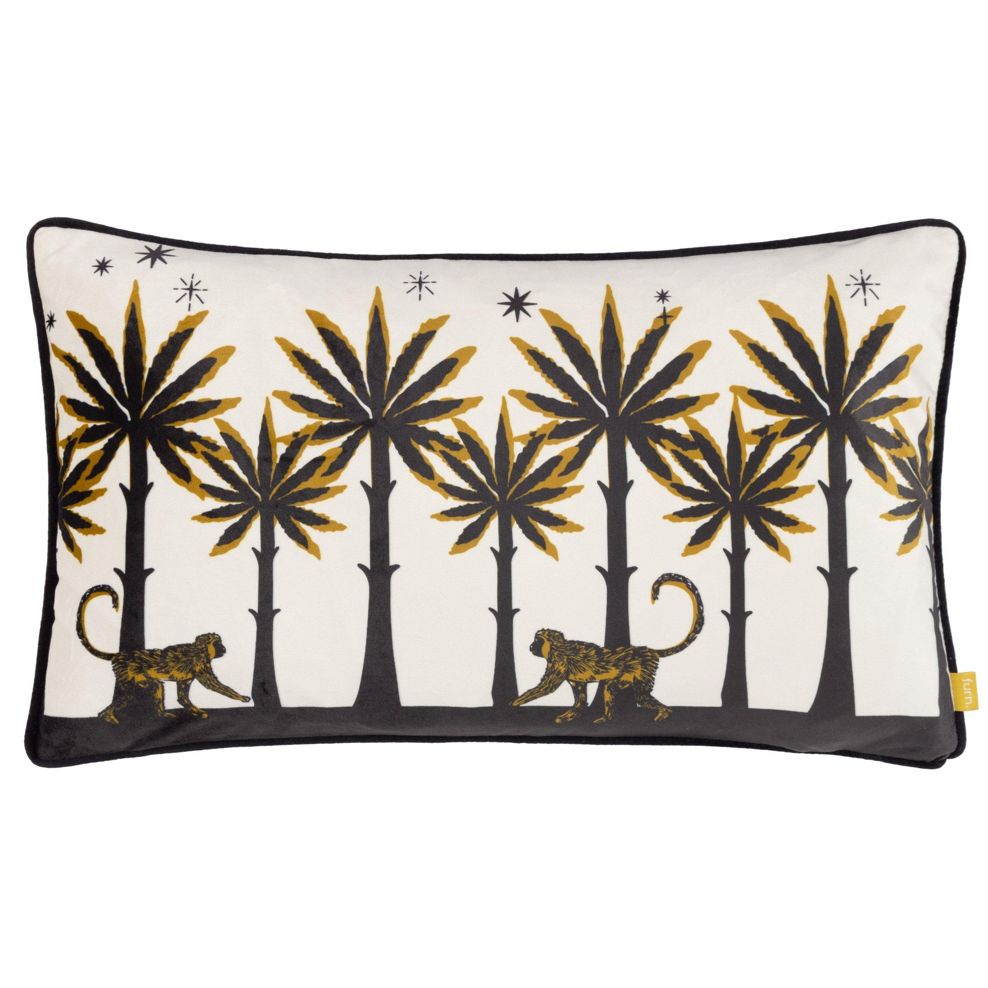 Ivory velvet cushion featuring a black and gold monkey and palm tree design, piped edges, measuring 30 cm x 50 cm.