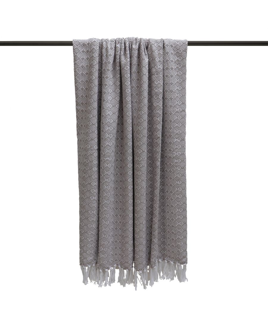 Grey cotton throw measuring 130 cm x 180 cm, featuring a textured pattern with decorative fringes at the ends, hanging elegantly on a rod.