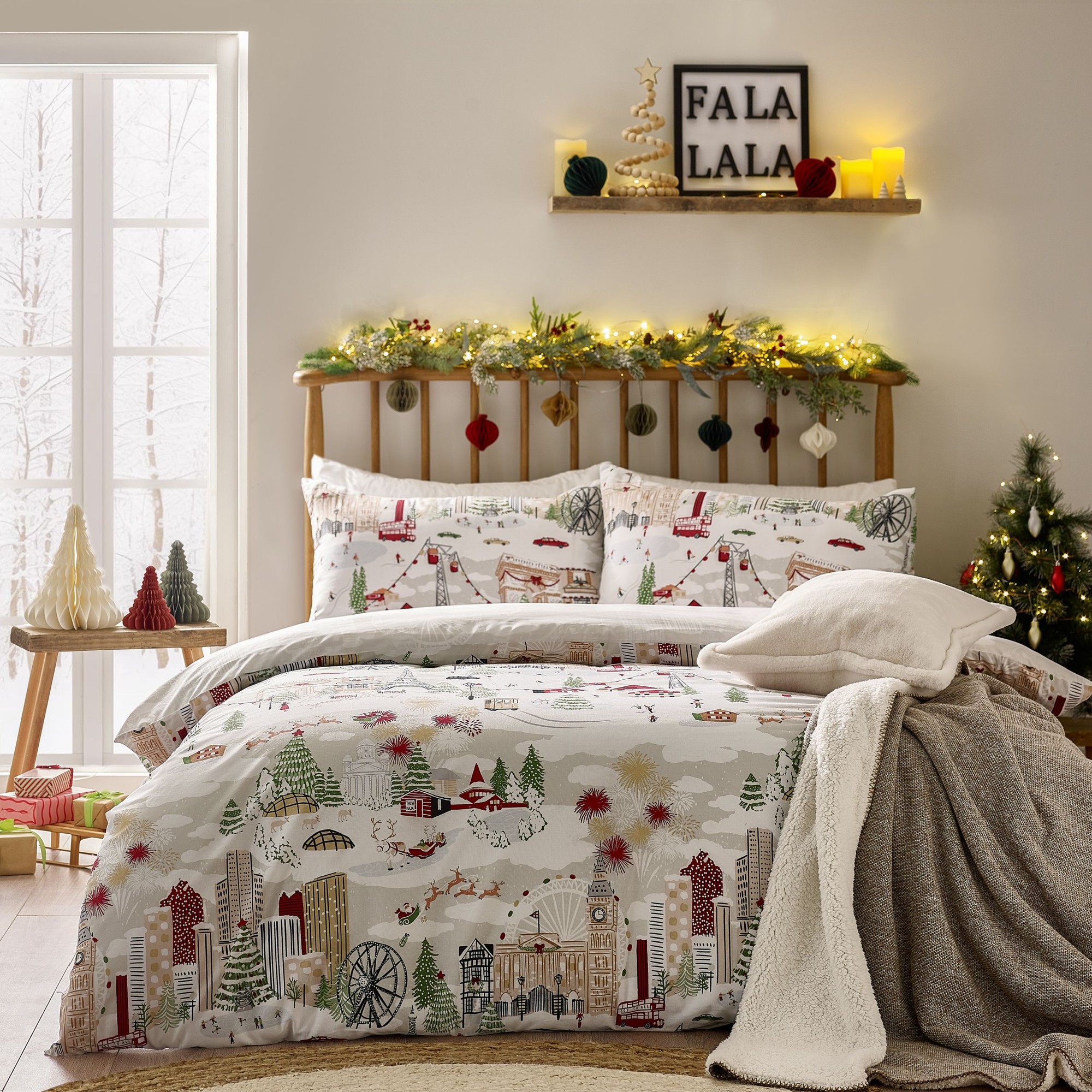 Festive printed duvet cover set featuring colorful holiday-themed designs on a soft fabric, complemented by matching pillowcases, set against a cozy, decorated bedroom backdrop.