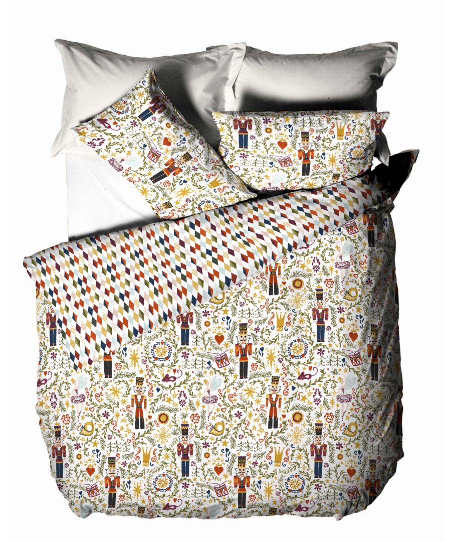 Multicolour cotton duvet set featuring a whimsical nutcracker design with floral and geometric patterns, includes a double duvet cover and matching pillowcases.