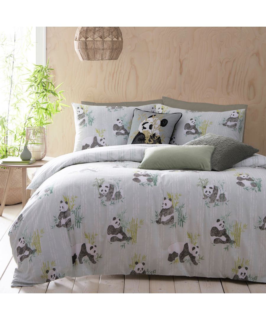 Mint cotton duvet cover set featuring playful panda illustrations, complemented by matching pillowcases and a decorative cushion, set against a light wood backdrop.