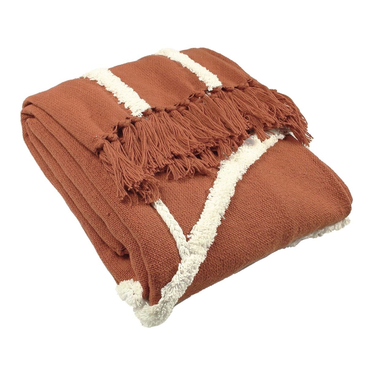 Red tufted cotton throw blanket featuring white tassels and striped detailing, adding a cozy and vibrant touch to any space.