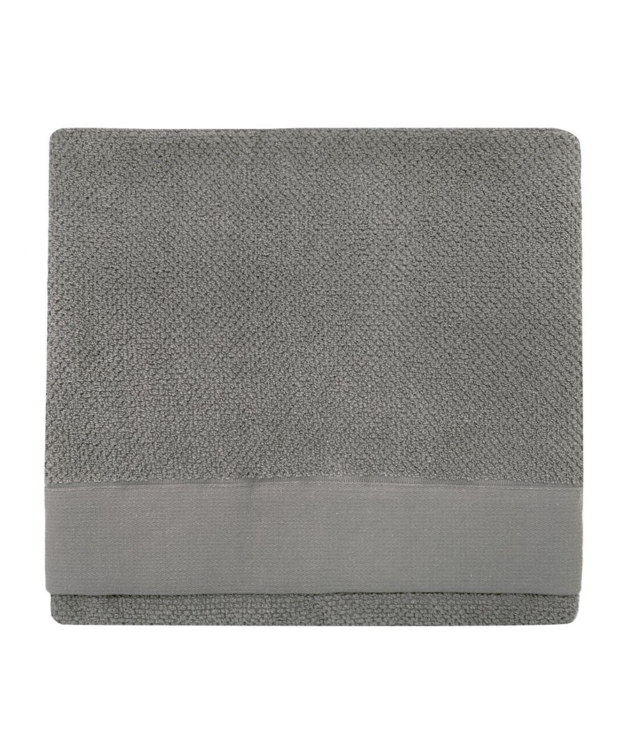 Textured grey cotton bath towel featuring a soft weave and a smooth border, designed for comfort and absorbency, measuring one size.