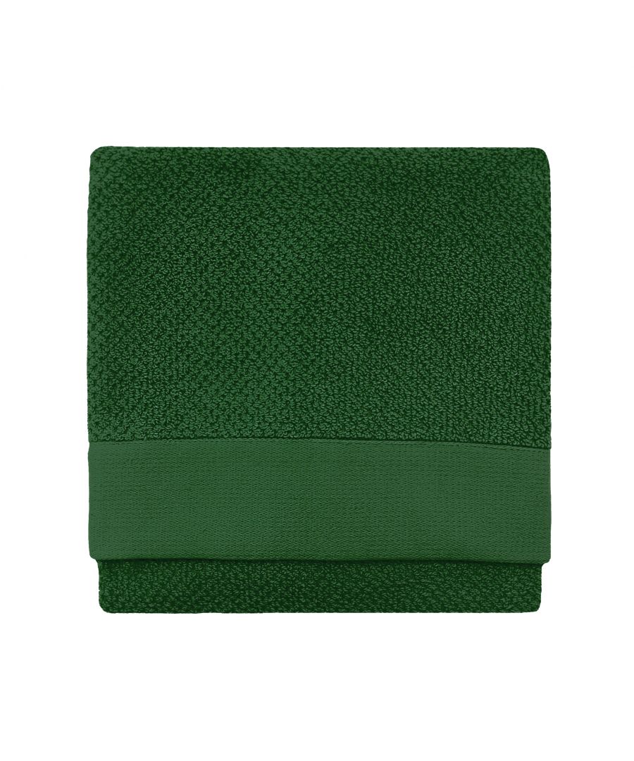 Textured green cotton hand towel featuring a soft weave and a smooth band at the bottom, measuring one size, ideal for adding a touch of color to any bathroom.