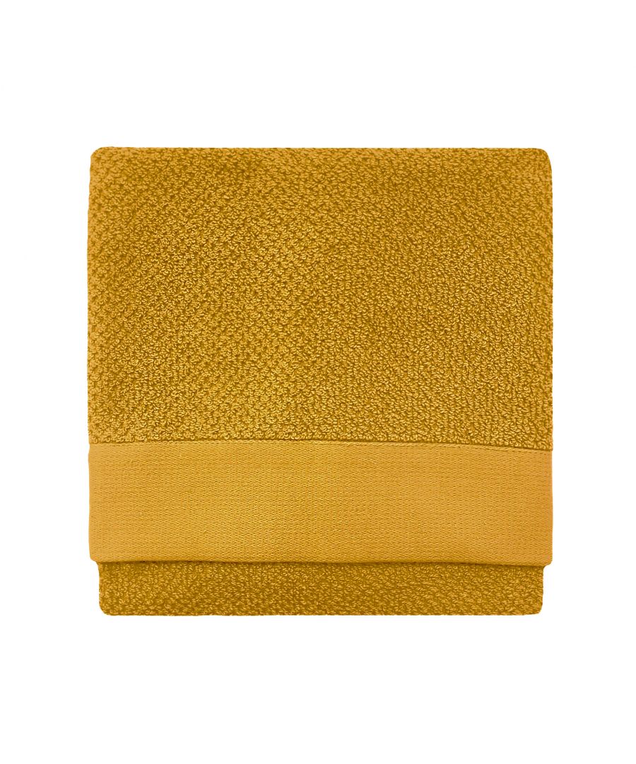 Textured yellow cotton hand towel featuring a woven design and a solid band at the bottom, measuring one size.