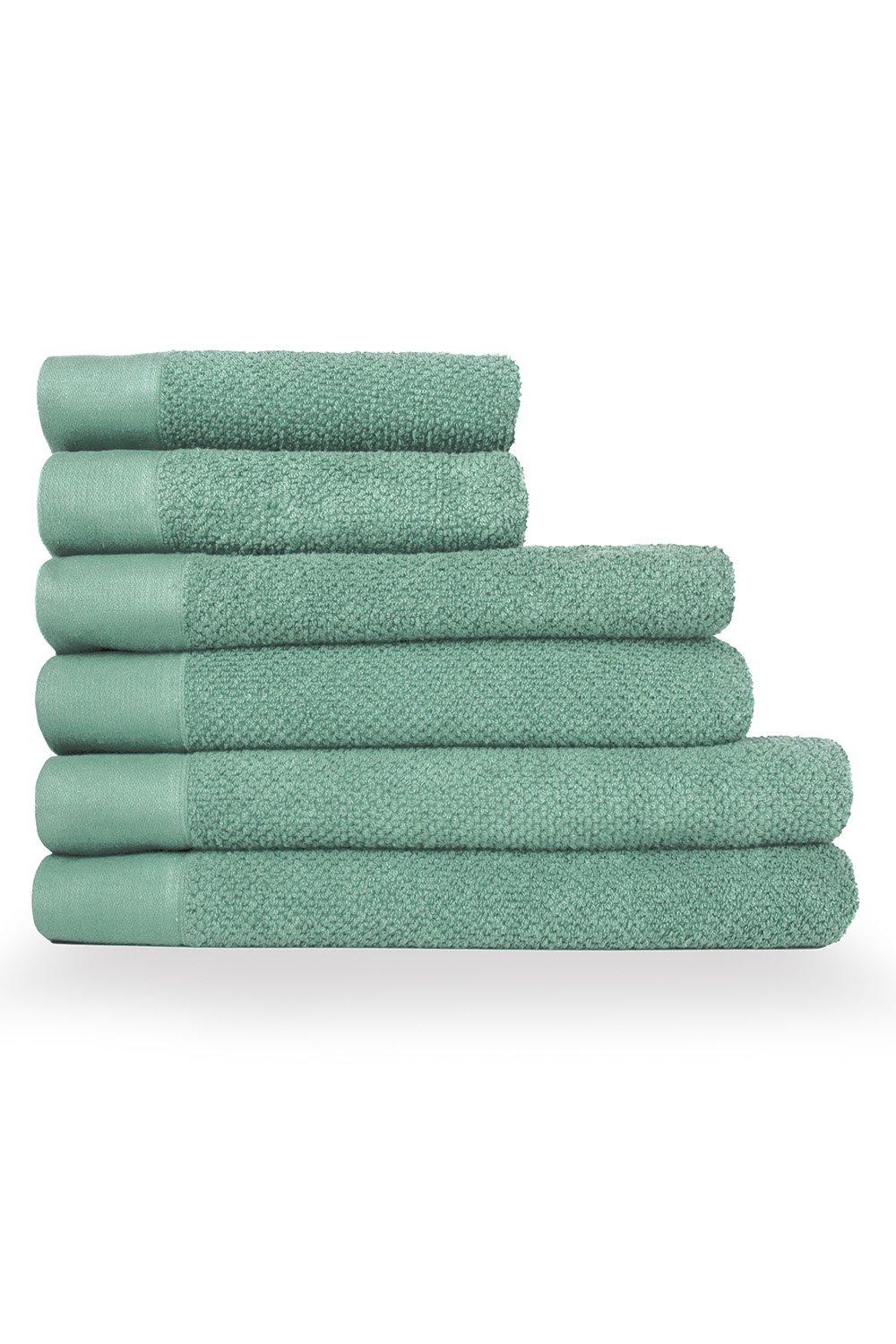 Textured weave cotton towel bale in a soft mint green, featuring six neatly stacked towels with contrasting smooth and terry cloth sections.