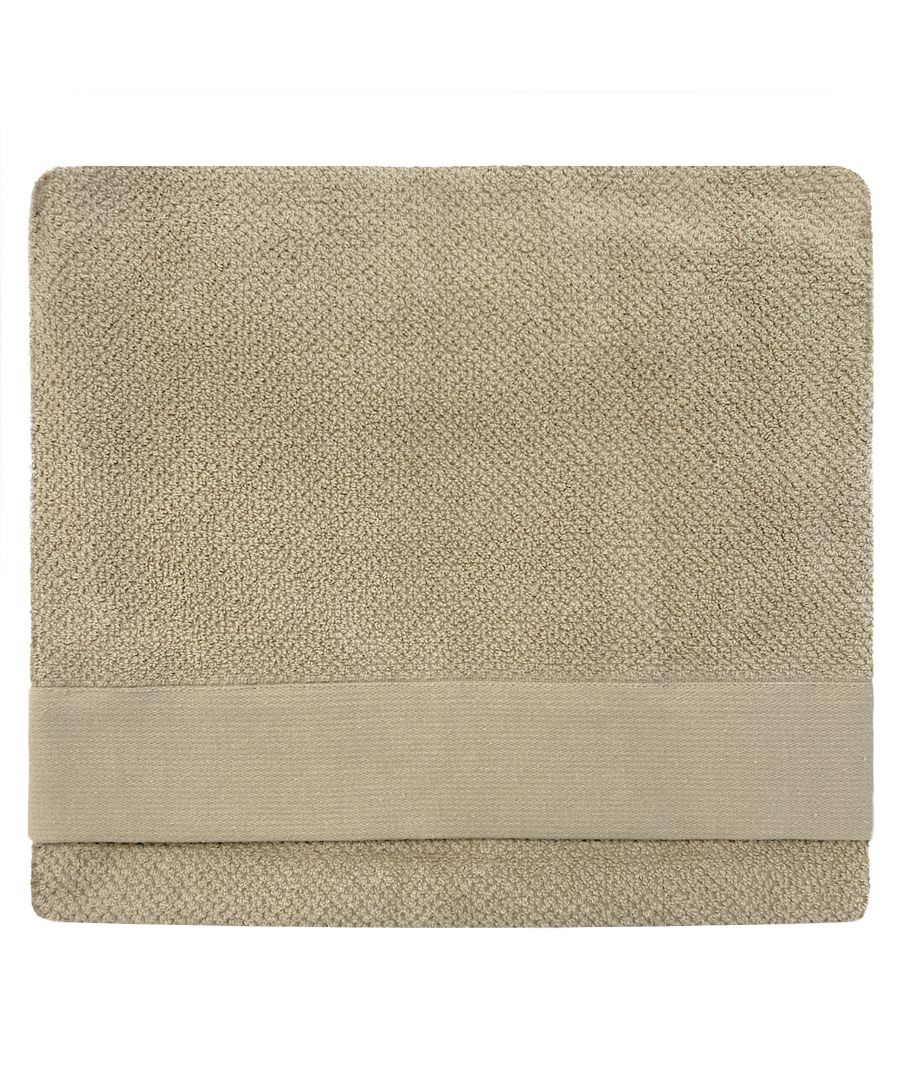 Beige textured weave towel featuring a soft, absorbent surface and a smooth band along one edge for added style and functionality.