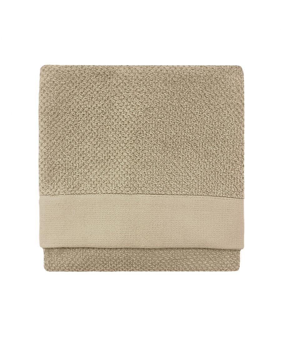 Textured weave hand towel in a natural cotton material, featuring a soft beige color with a smooth band at the bottom, measuring 50x90x1cm.