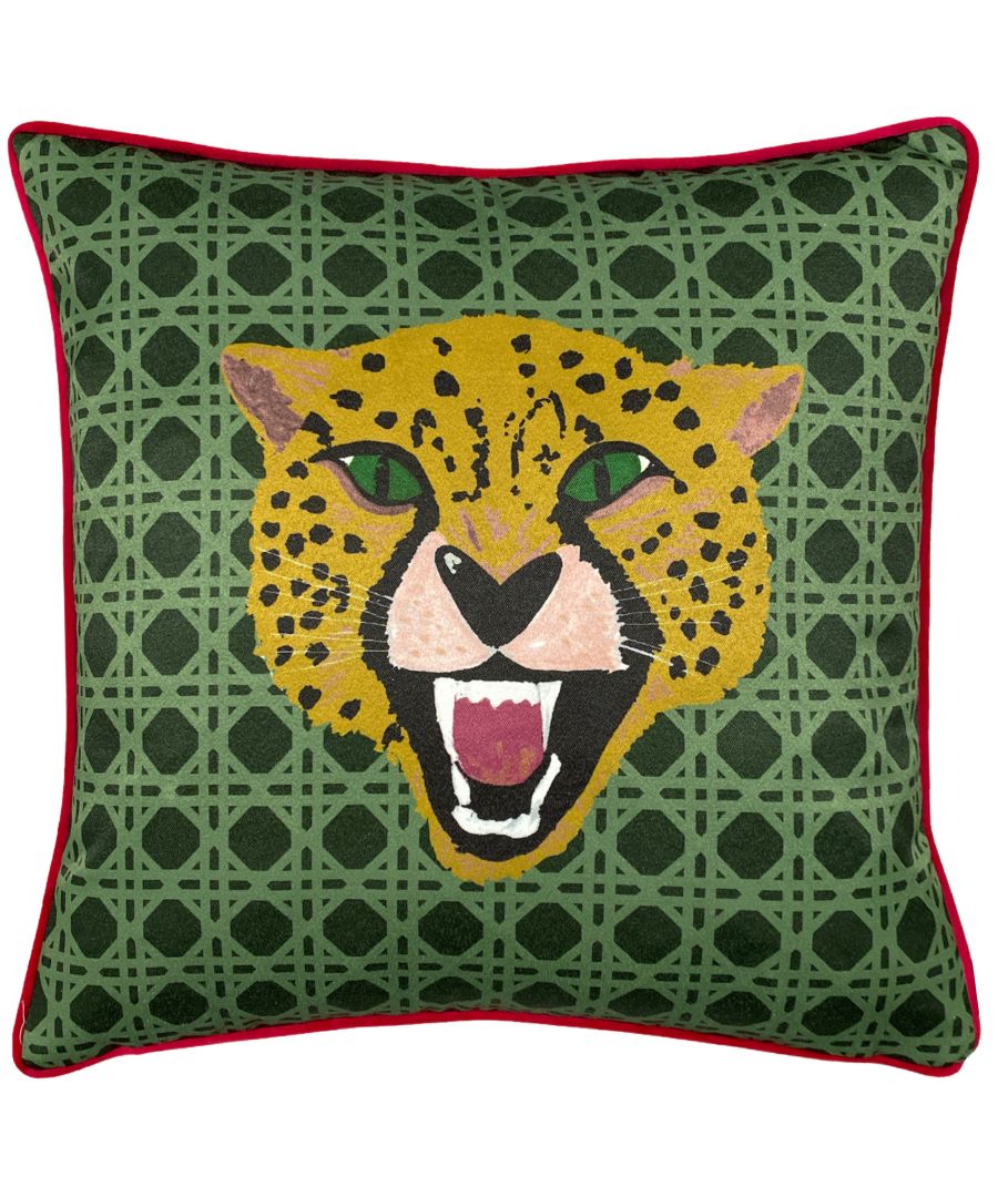 Green cushion featuring a bold cheetah face design with striking green eyes, surrounded by a geometric pattern, finished with a red piped edge.