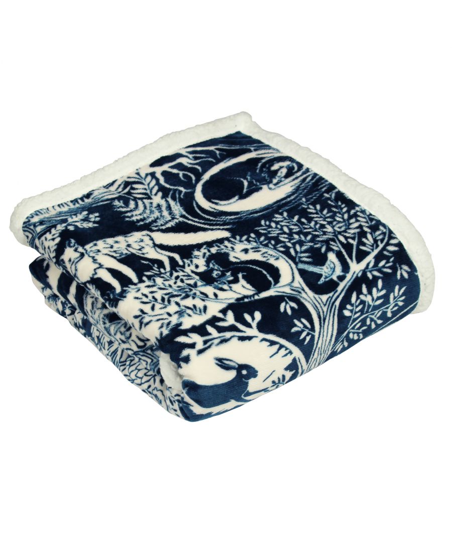 Navy fleece throw blanket featuring a winter woods design with animals and trees, measuring 130 cm x 150 cm, with a soft, plush texture and a white trim.