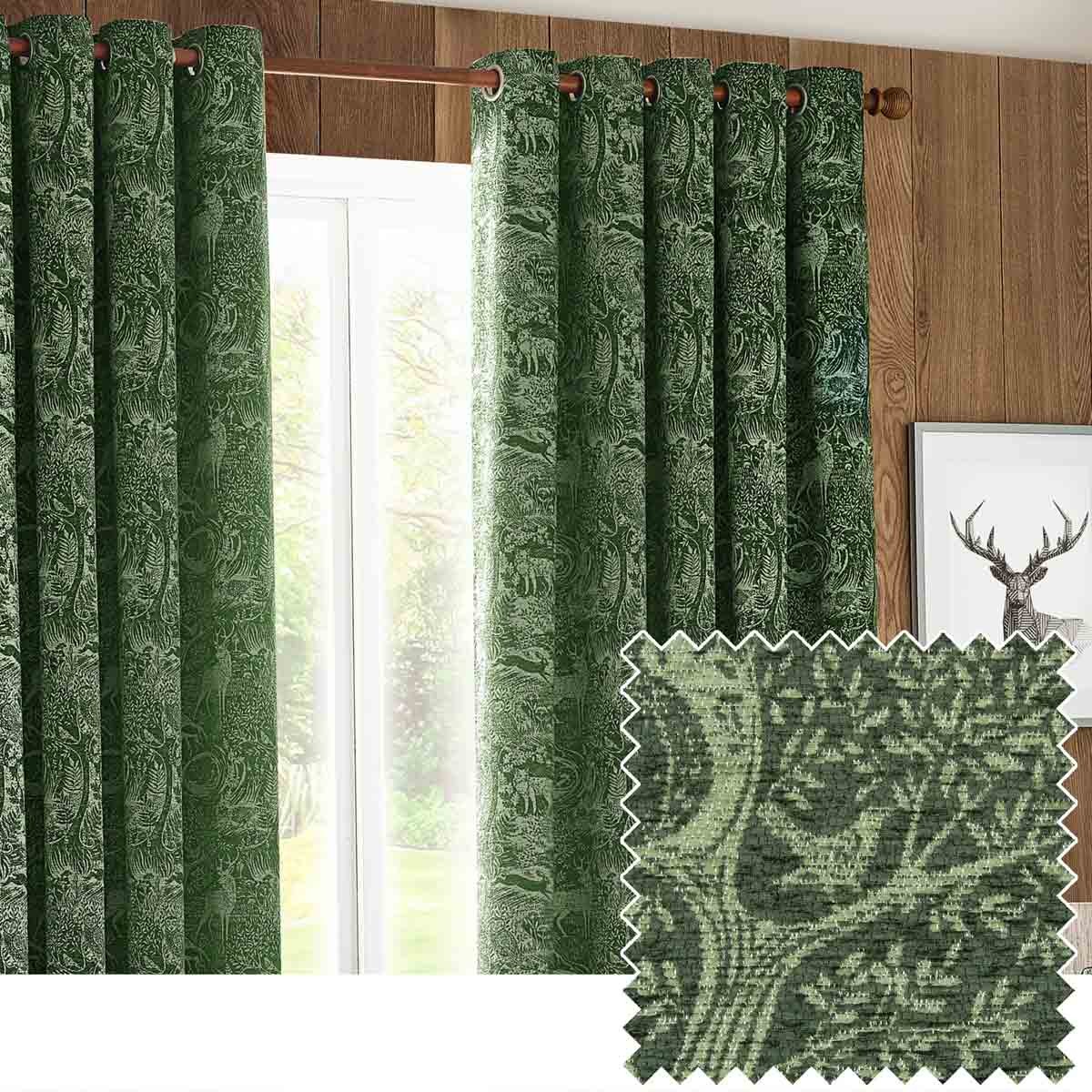 Emerald green chenille eyelet curtains featuring a winter woods animal pattern, measuring 229cm wide by 183cm drop, with a textured fabric and a natural wood backdrop.