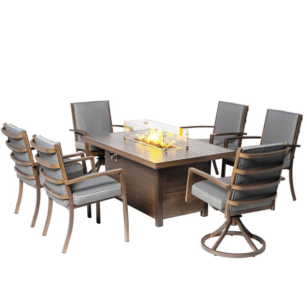 7-piece aluminum patio dining set featuring a rectangular table with a fire pit, surrounded by 2 swivel chairs and 4 armchairs, all with gray cushions.