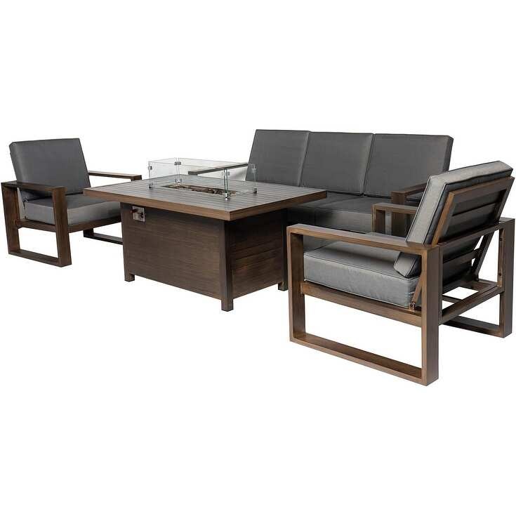Grey L-shaped garden corner sofa set featuring plush cushions, wooden frame, and a glass-top coffee table with a fire pit in the center, ideal for outdoor relaxation.