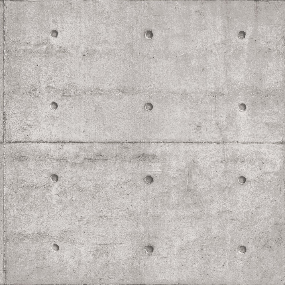 Textured grey concrete blocks with a grunge finish, featuring visible rivets and a matte surface, showcasing an industrial design aesthetic.