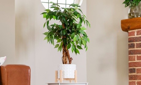 Lifelike artificial bamboo plant, 90cm tall, featuring vibrant green leaves and a textured brown trunk, presented in a stylish white pot with a wooden stand.