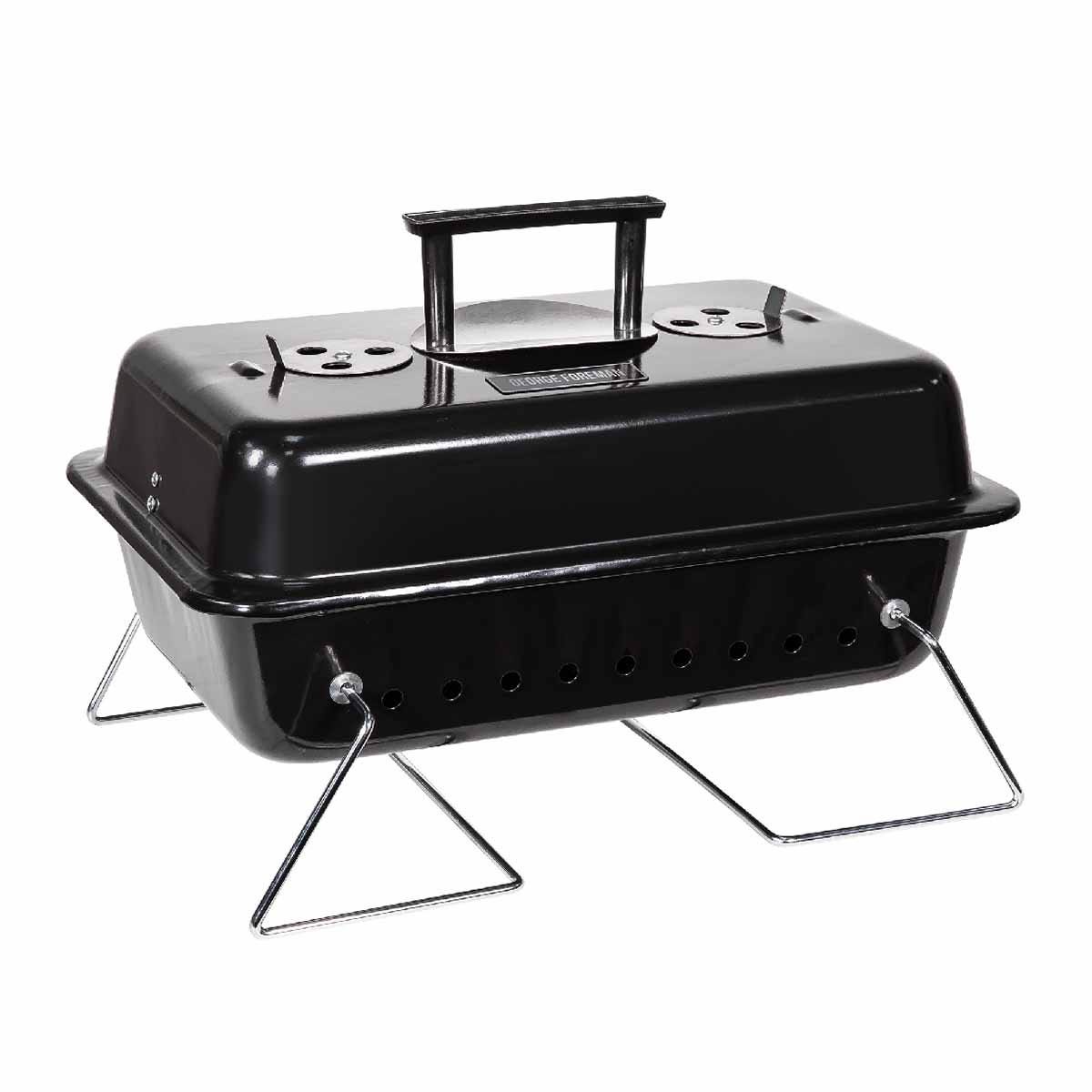 Black portable charcoal BBQ with foldable legs, convenient handle, and ventilation holes, featuring a sleek design by George Foreman.