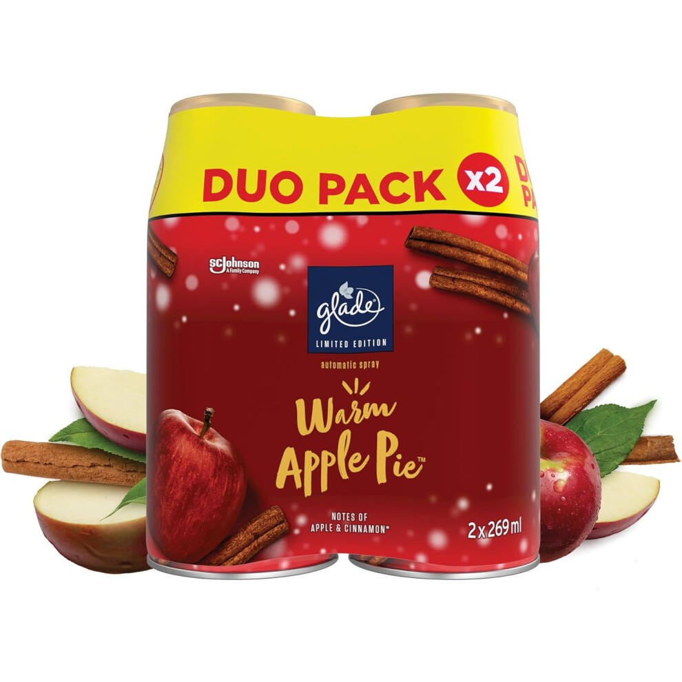 Two Glade automatic spray refills in a duo pack, each 269ml, featuring a warm apple pie scent with red apples, cinnamon sticks, and green leaves in the background.
