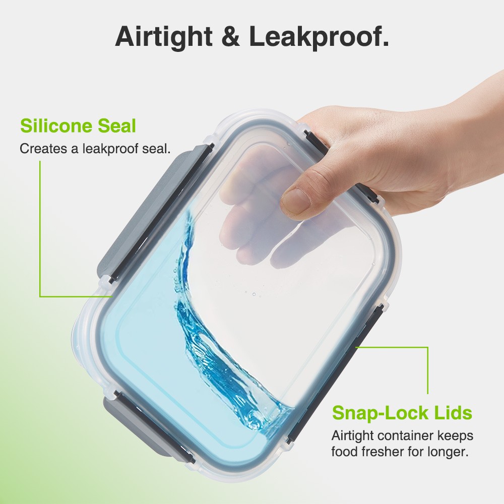 Clear glass food storage container with a silicone seal and snap-lock lids, showcasing a hand holding the container with water inside, emphasizing airtight and leakproof features.